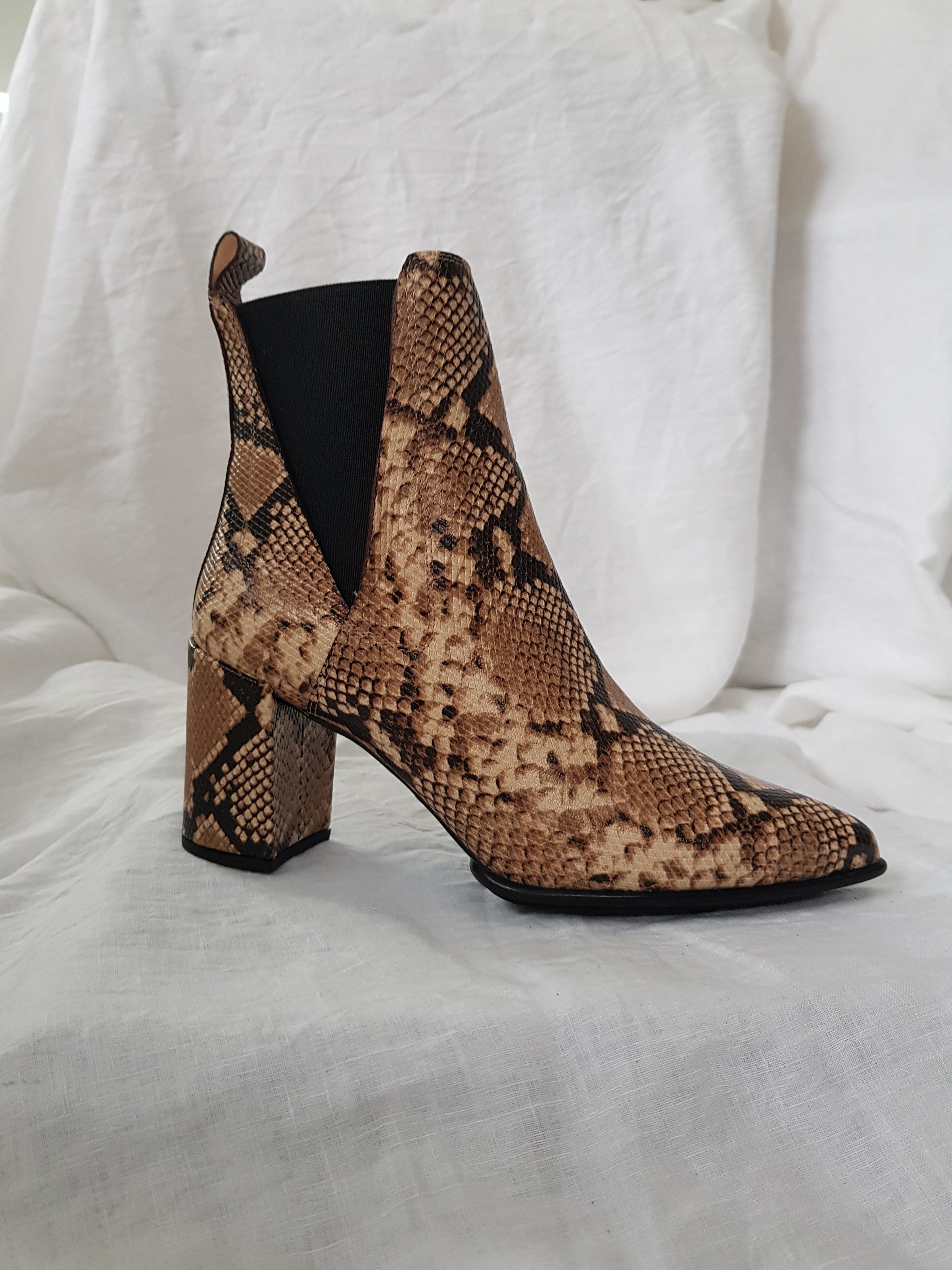Unisa kilman viper leather pull on heeled ankle boot online at hunterminx