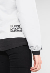 Grey Hooded SD Windtrekker jacket by Superdry logo close up