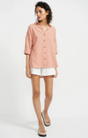 staple the label harvest oversized short sleeve shirt in peach with white shorts