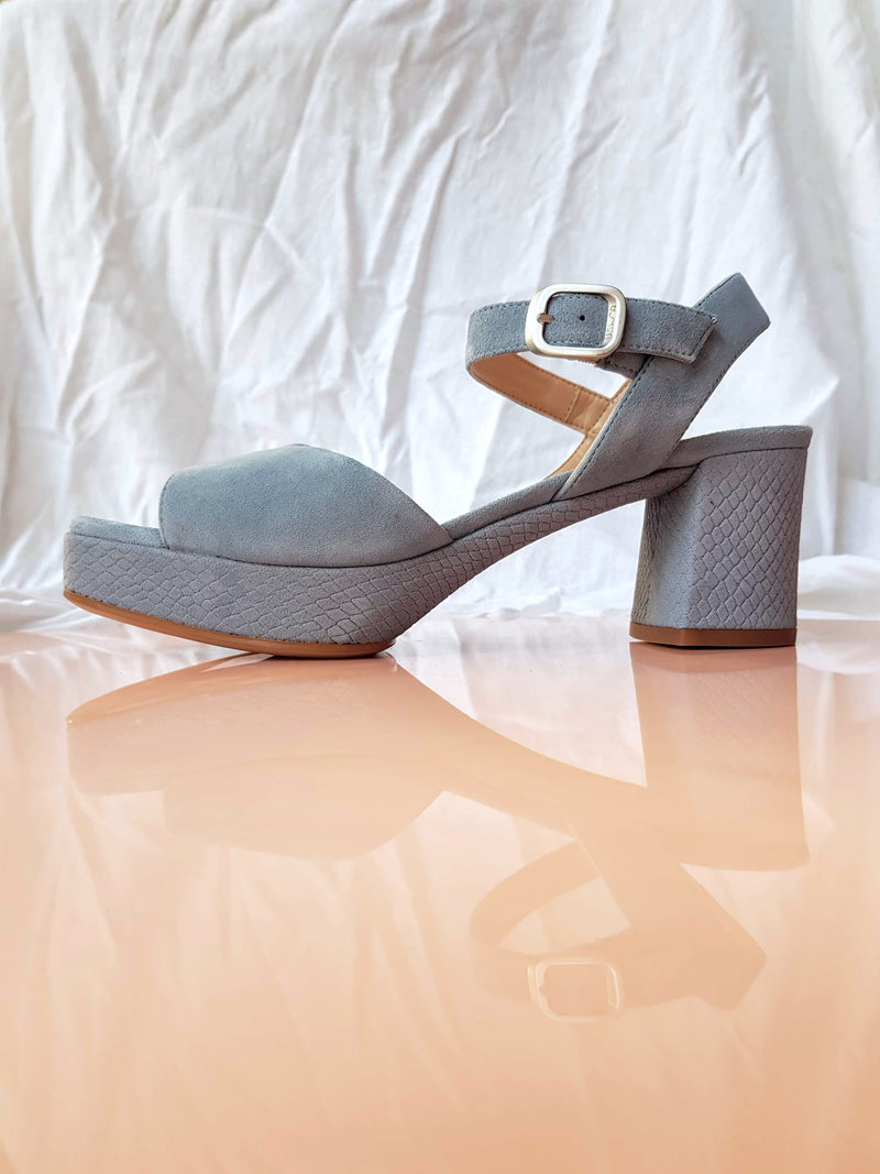 blue suede platform heels with ankle strap and silver buckle python laser cut heel and platform