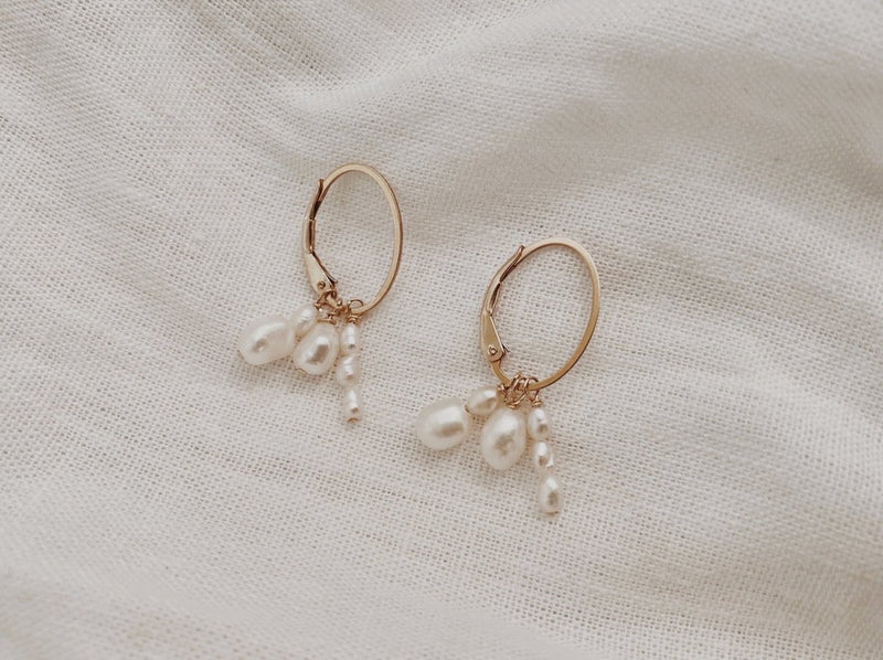 pearl cluster earrings on yellow gold hoops finerrings three strands