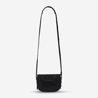 status anxiety black leather crossbody bag in her command front hanging hunterminx