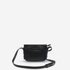 status anxiety black leather crossbody bag in her command front hunterminx