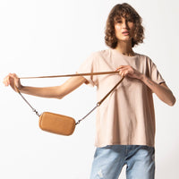 status anxiety new normal tan cross body bag with chain detail online at hunterminx 